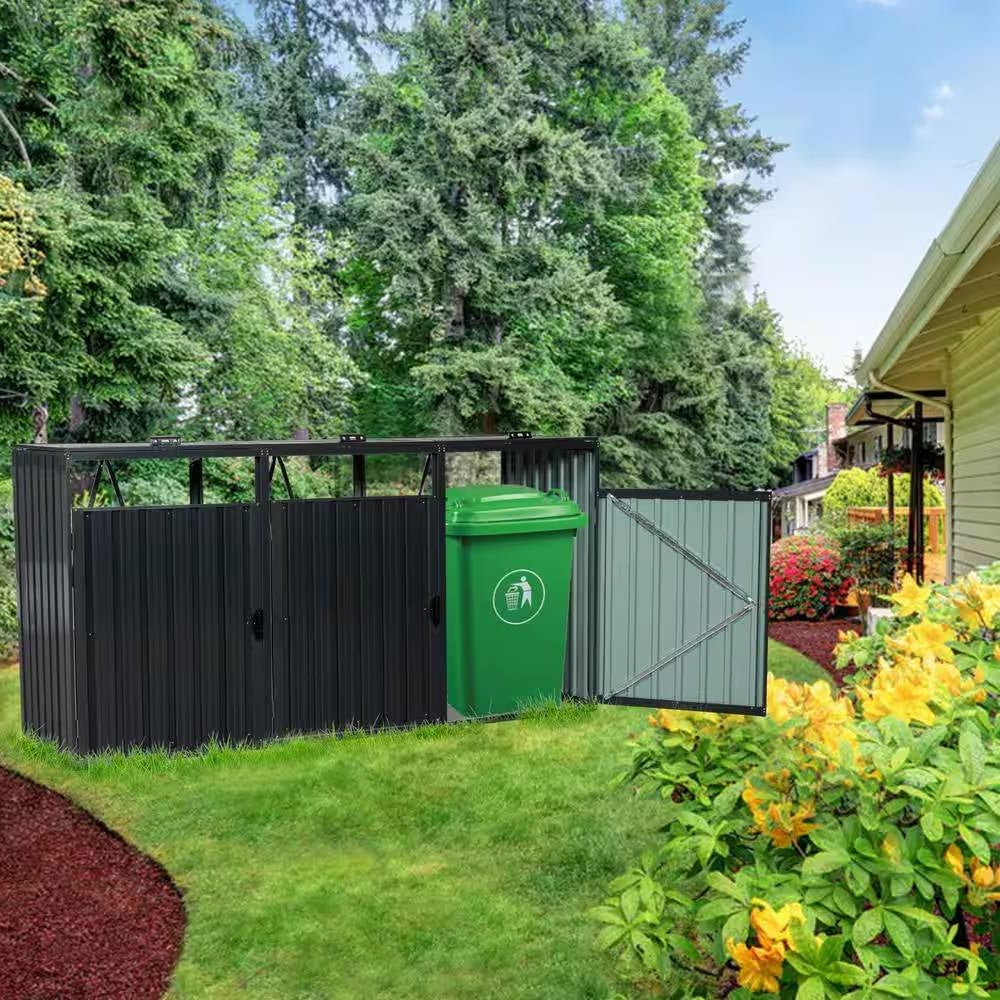 Outdoor Black Galvanized Steel Garbage Bin Storage Shed - Holds 3 Trash Cans on a garden lawn
