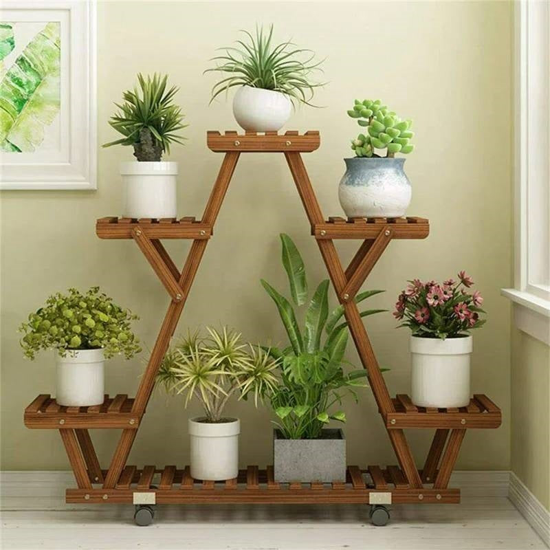 Indoor Outdoor Solid Wood Triangular Multi-Tier Plant Stand with Locking Wheels holding potted plants