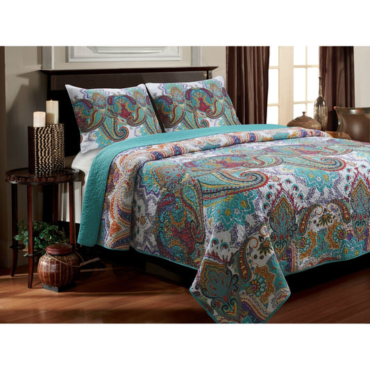 Twin size 3-Piece Cotton Quilt Set in Teal Multi-Color Paisley Pattern on bed with solid turquoise back