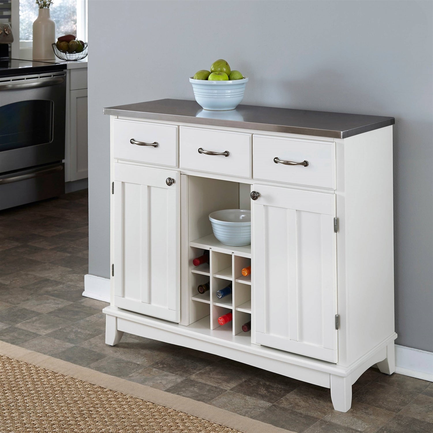 Stainless Steel Top Kitchen Island Sideboard Cabinet Wine Rack in White with three drawers and cabinet doors