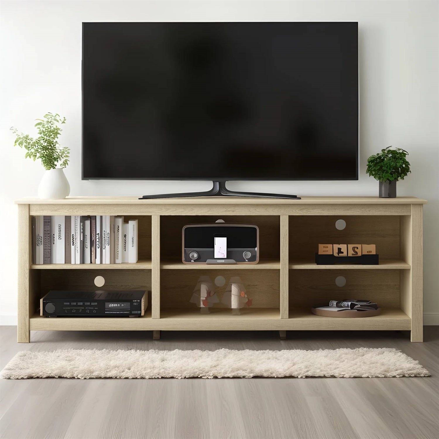 Farmhouse TV Stand in Light Oak Wood Finish - for TVs up to 70-inch with six open compartments in living room setting