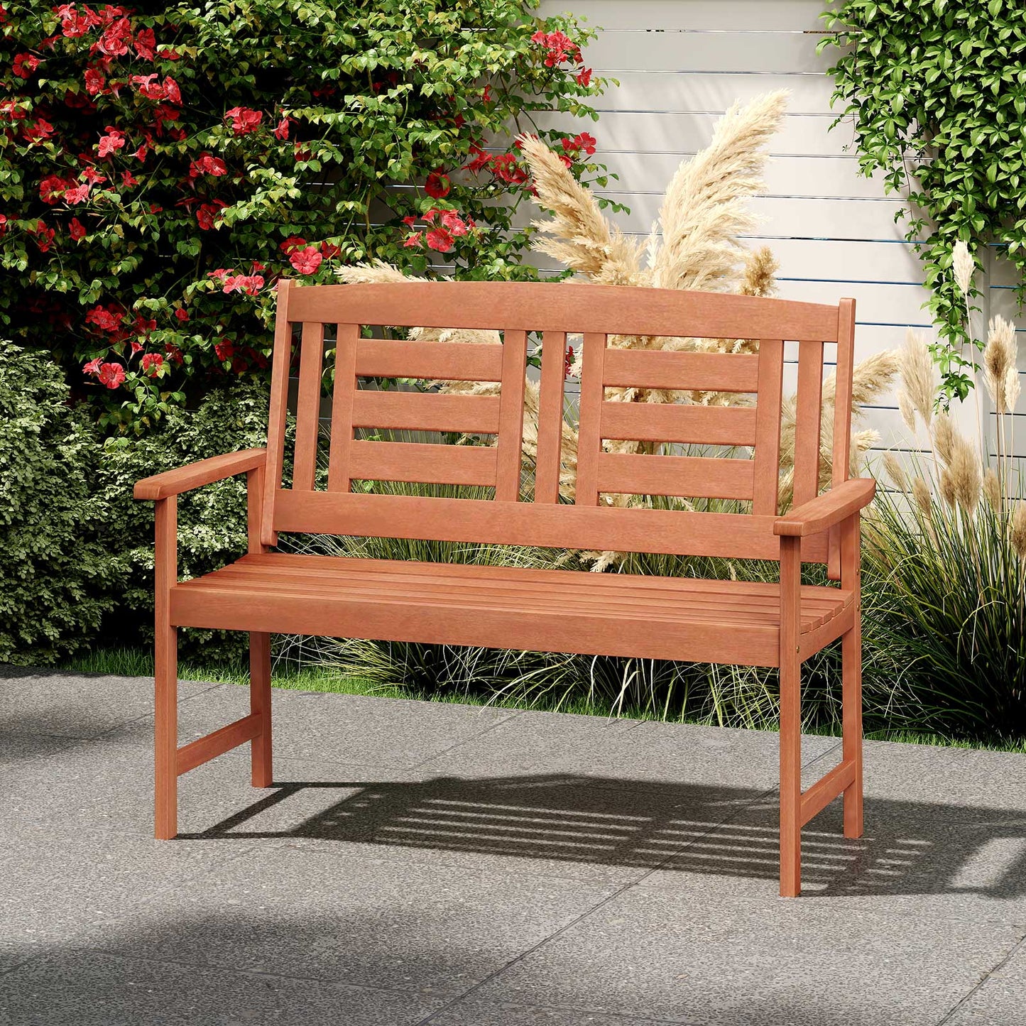 Outdoor Solid Wood Loveseat Hardwood 2-Seat Bench with Inclined Backrest and Slatted Seat in a garden setting