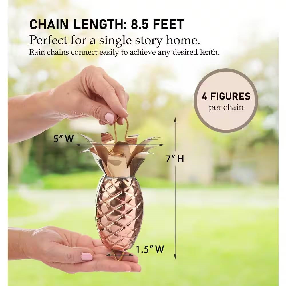 Person holding 8.5 Ft. Copper Pineapple Rain Chain Gutter Downspout - Basin Not Included with measurement details