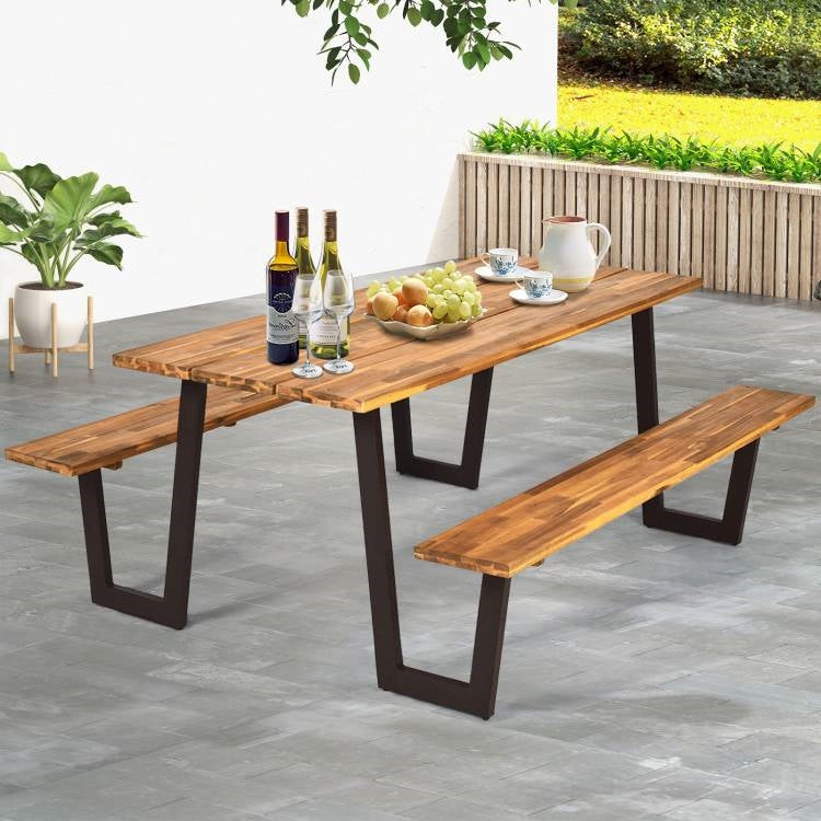 Modern Wooden Picnic Table with 2 Benches Outdoor Patio Dining Set made of acacia wood and strong metal frame with food display on top.