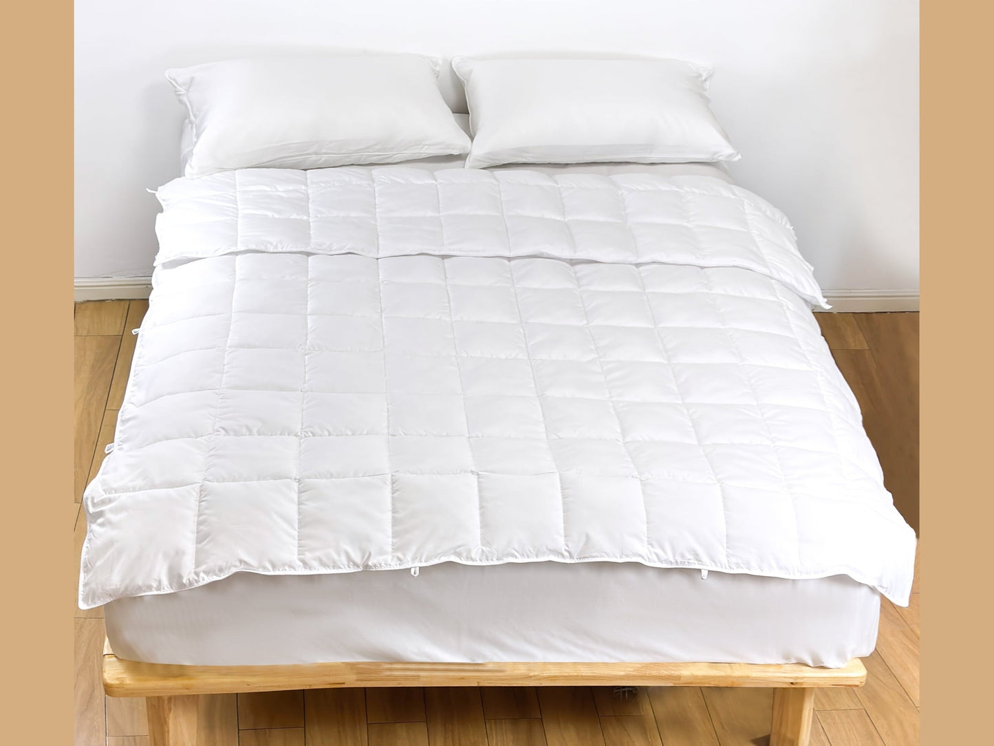 SHNUGGLE SNAP-EZ Quilt on bed, soft and snuggly, quilted design. Easy-to-attach loops, lightweight and dryer-safe convenience.