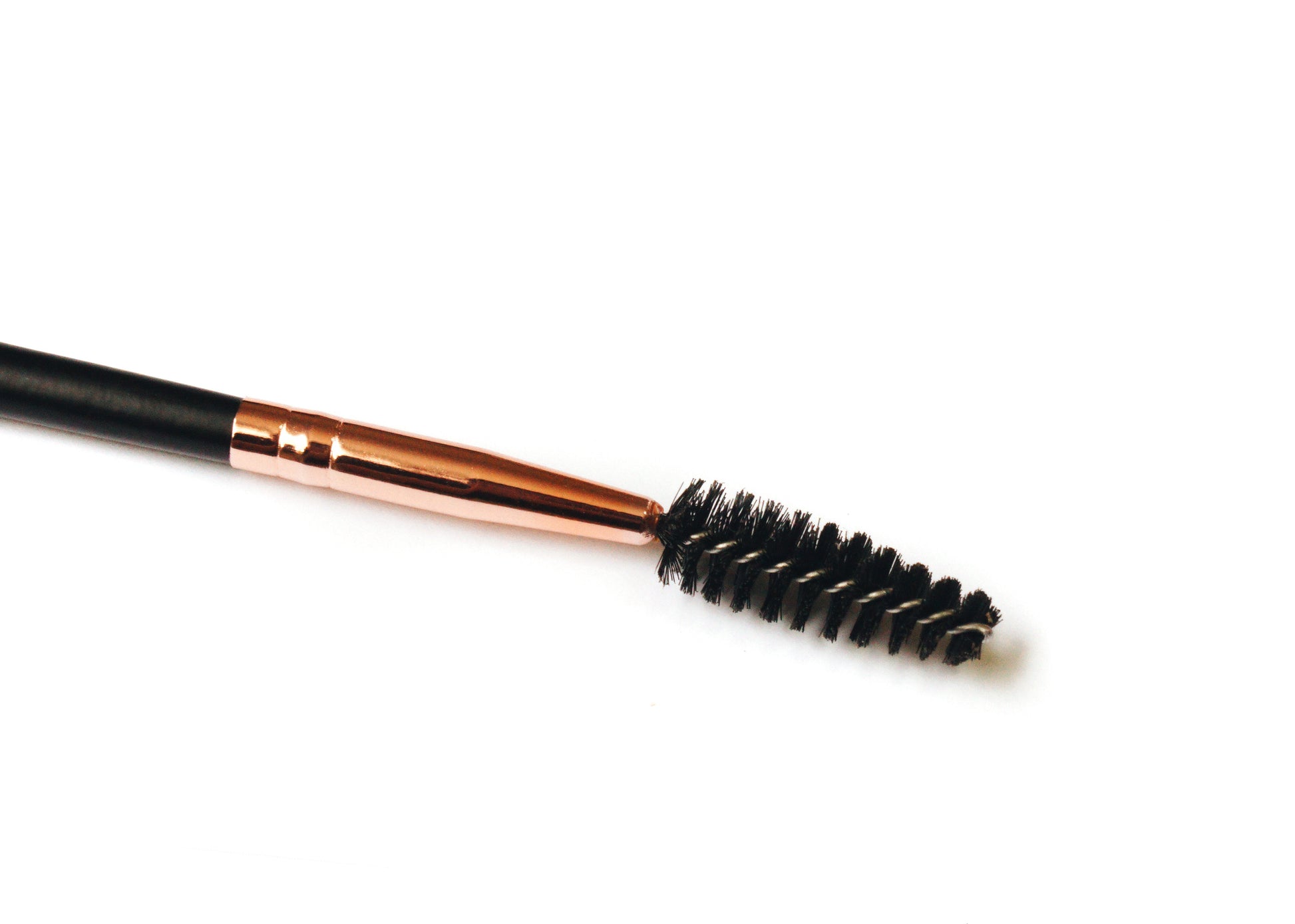 Power Brow Duo Brush with spoolie for precise brow grooming and shaping, ideal for use with creams and powders, vegan and cruelty-free.