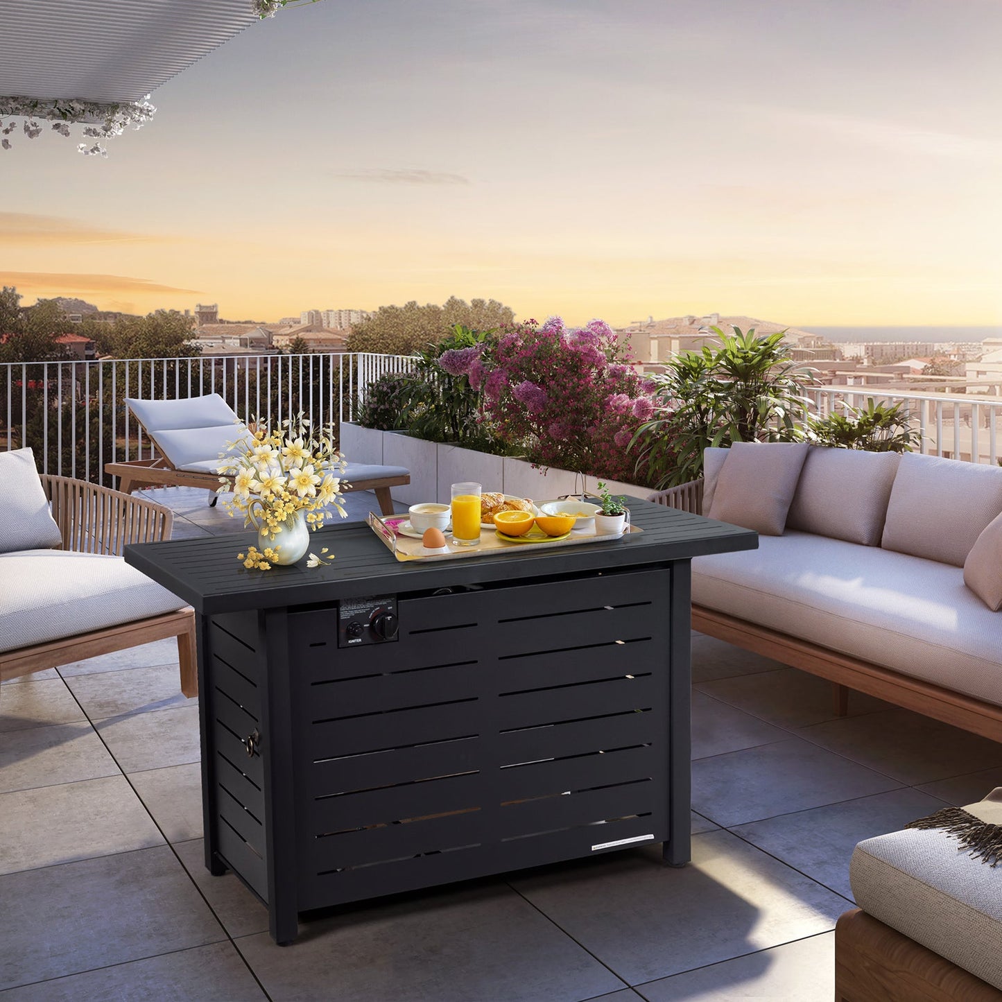 42 Inch 60 000 BTU Rectangular Propane Fire Pit Table with Waterproof Cover on a patio with seating and plants