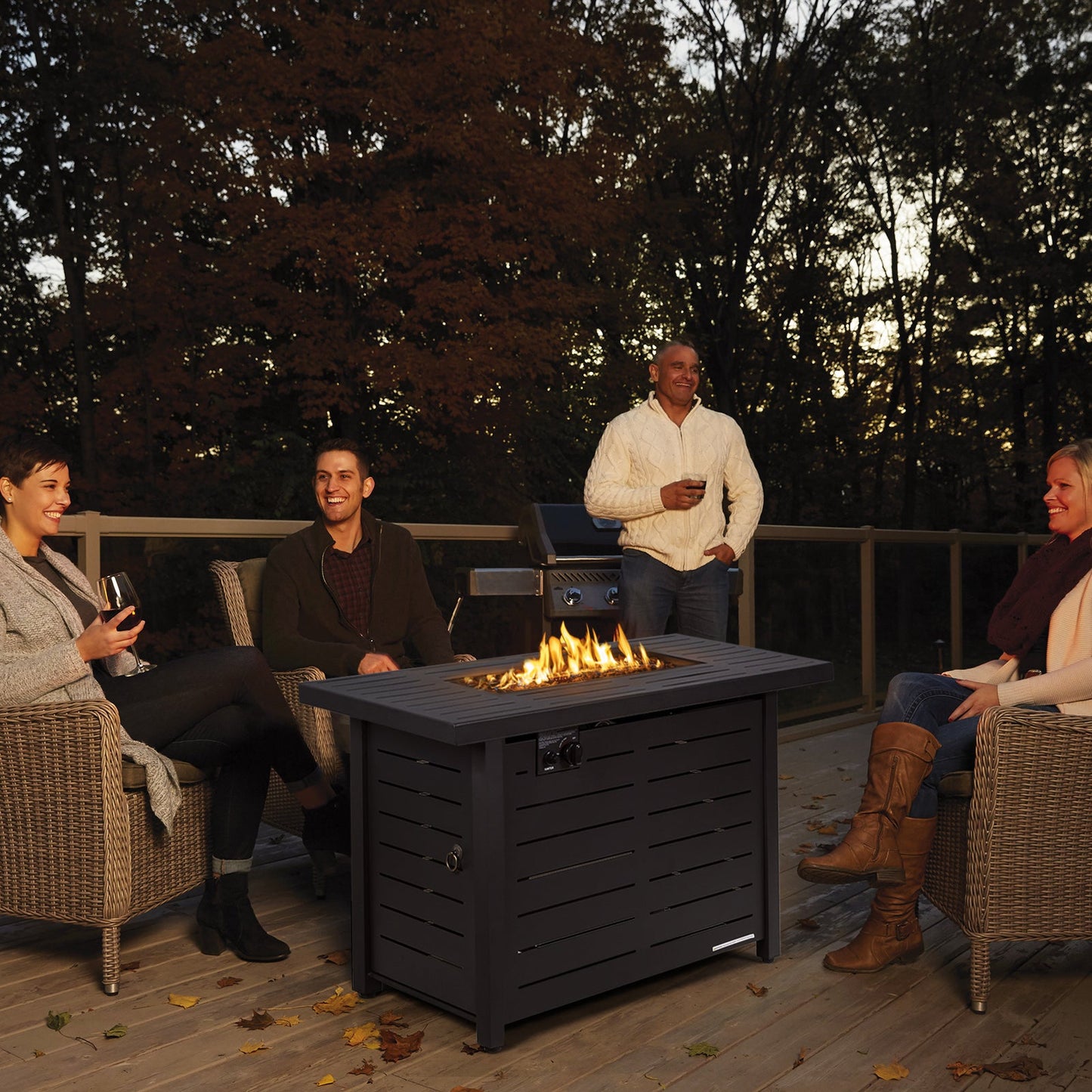 Outdoor gathering around 42 Inch 60 000 BTU Rectangular Propane Fire Pit Table with Waterproof Cover.