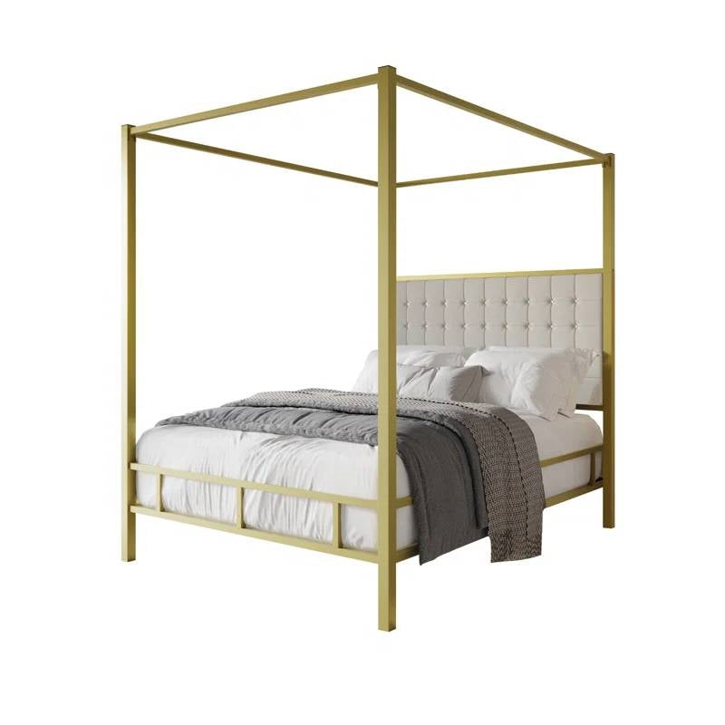 Queen size Gold Metal Canopy Bed with Upholstered Button-Tufted Headboard in bedroom setting.