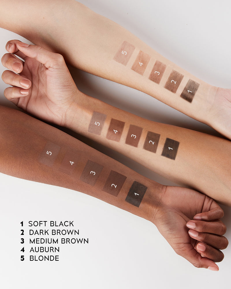 Skin tone swatches showcasing Revelation Brow Duo shades: soft black, dark brown, medium brown, auburn, and blonde.