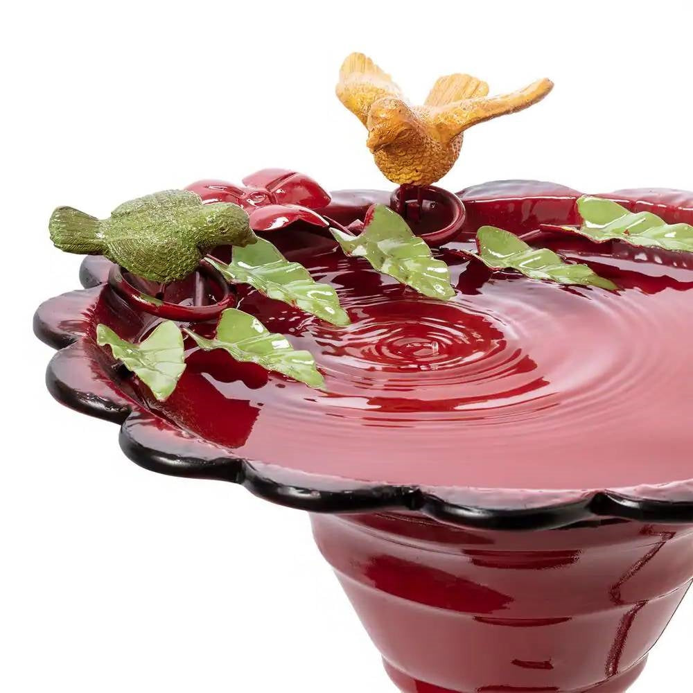 Red Metal Outdoor Garden Patio Birdbath with Decorative Bird Leaf Figurines featuring ornamental birds and leaves on the basin.