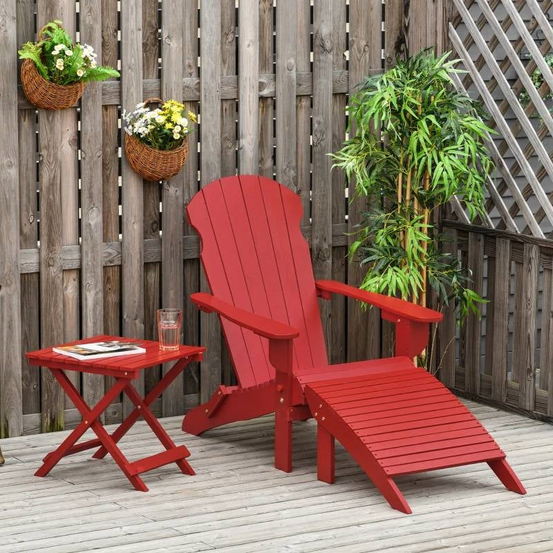 3-Piece Red Folding High-back Adirondack Chair Ottoman and Side Table in a garden setting