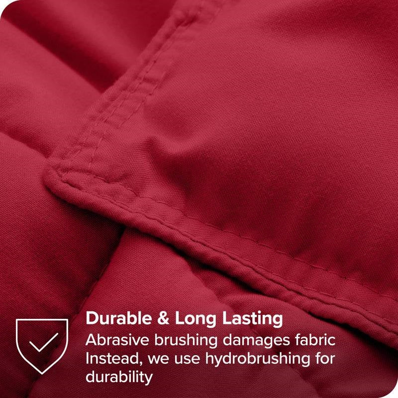 Close-up of King/Cal King Size All Season Super Soft Down Alternative Comforter Set Red, showcasing durable hydrobrushed material.
