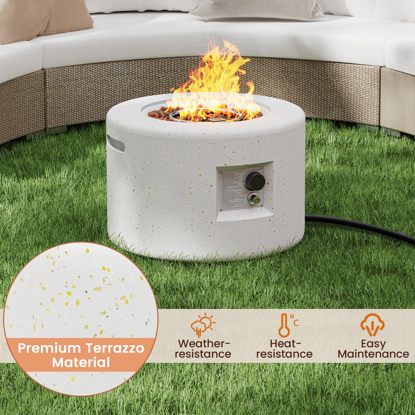 Round Terrazzo Propane Gas Fire Pit with Hideaway Tank Holder and Lava Rocks on grass with flame and material features displayed