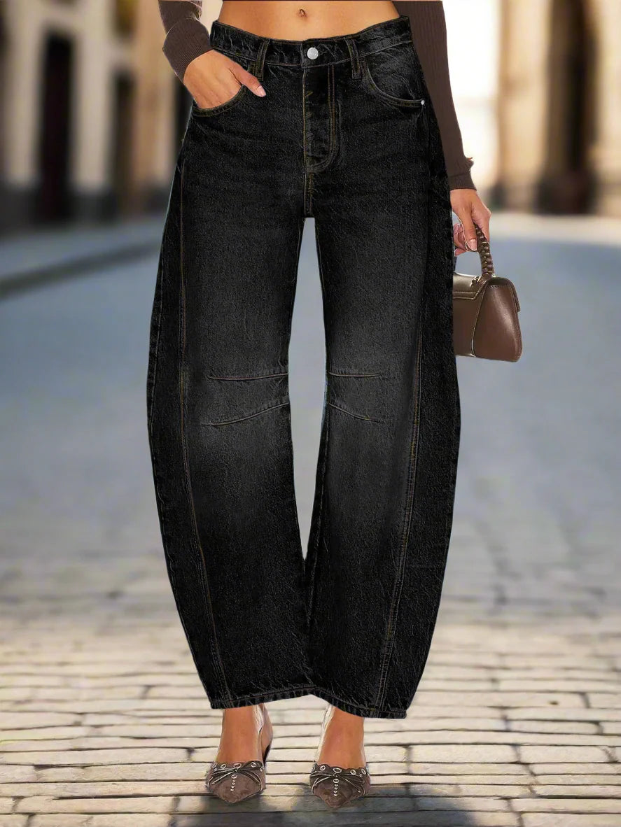 Woman wearing Women’s Elastic Waist High Waisted Jeans with a loose fit and cropped cut, showcasing trendy Korean-inspired style.