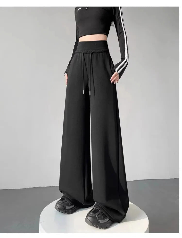 Gray High-Waist Loose Wide-Leg Straight Pants Women paired with black crop top and sneakers on a model.