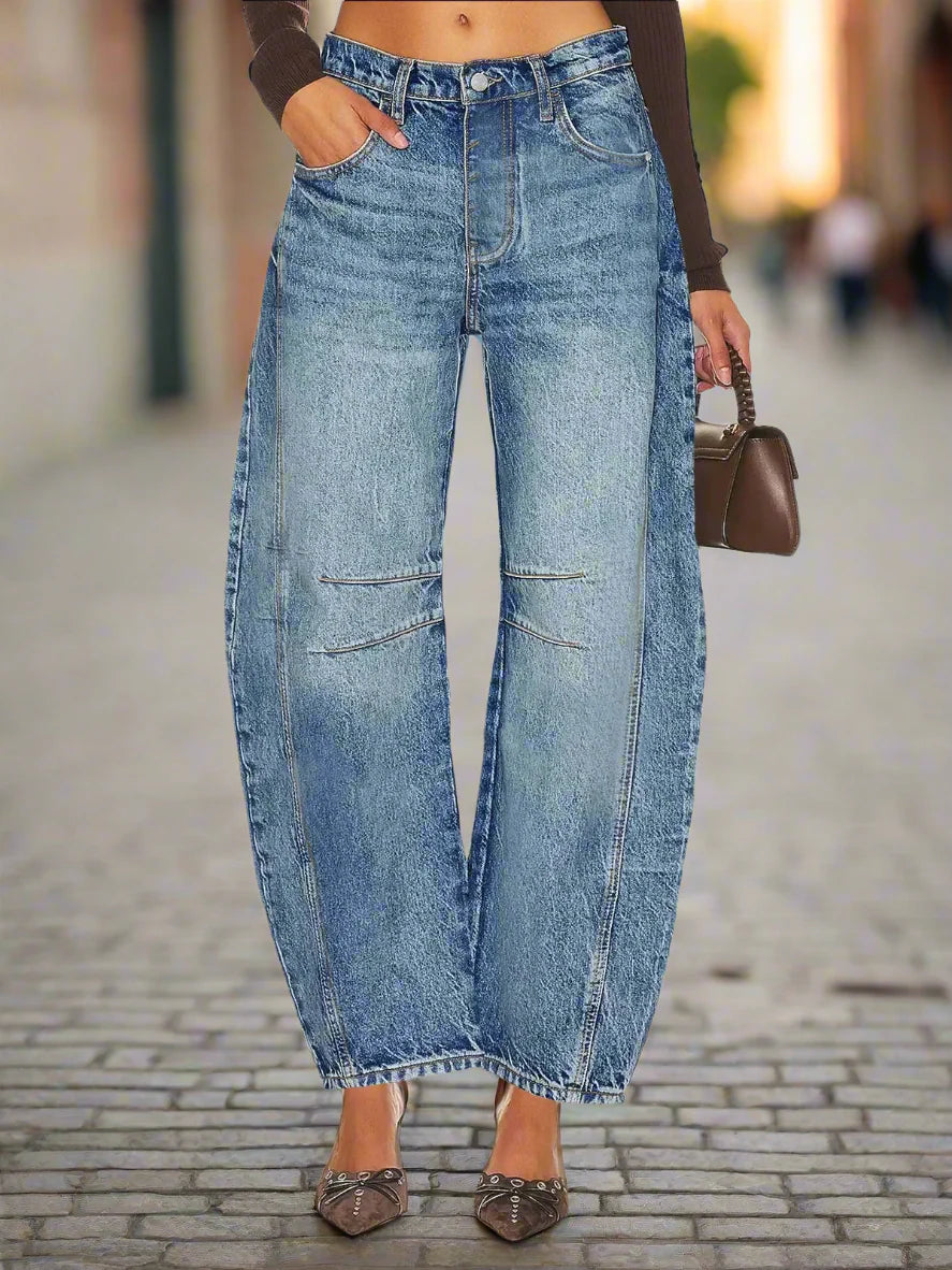 Women’s Elastic Waist High Waisted Jeans with loose fit and cropped cut for trendy comfort.