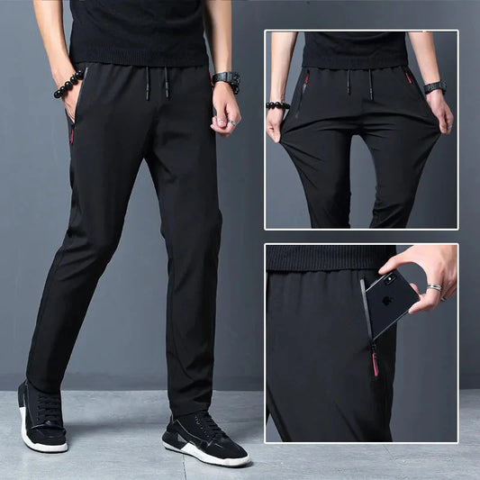 Slim Fit Stretch Jogger Pants with Elastic Waist in black, showing stretch fabric and pocket detail.