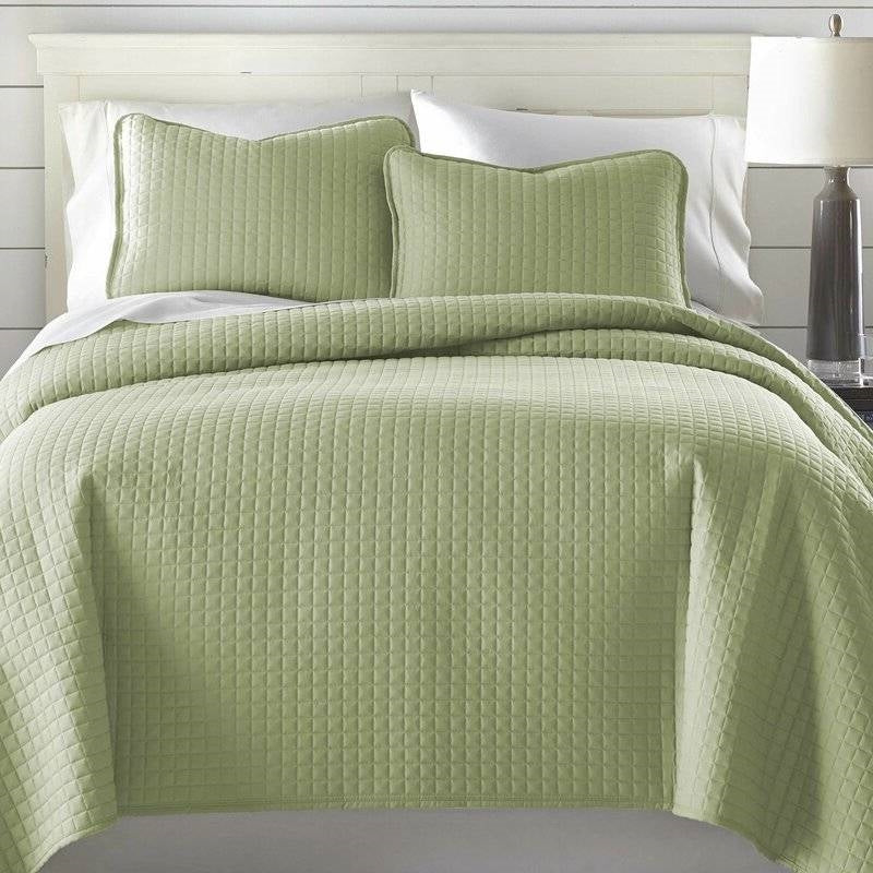 Twin/Twin XL Lightweight Sage Ultra Soft 2-Piece Microfiber Quilt Set on bed with two matching pillows