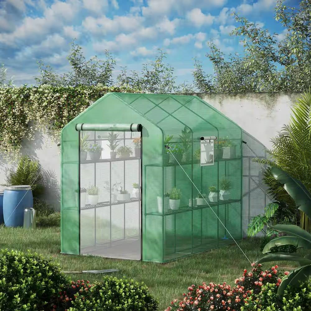 7 ft x 4.7 ft Oudoor Greenhouse with Steel Frame and Green PE Cover in garden setting