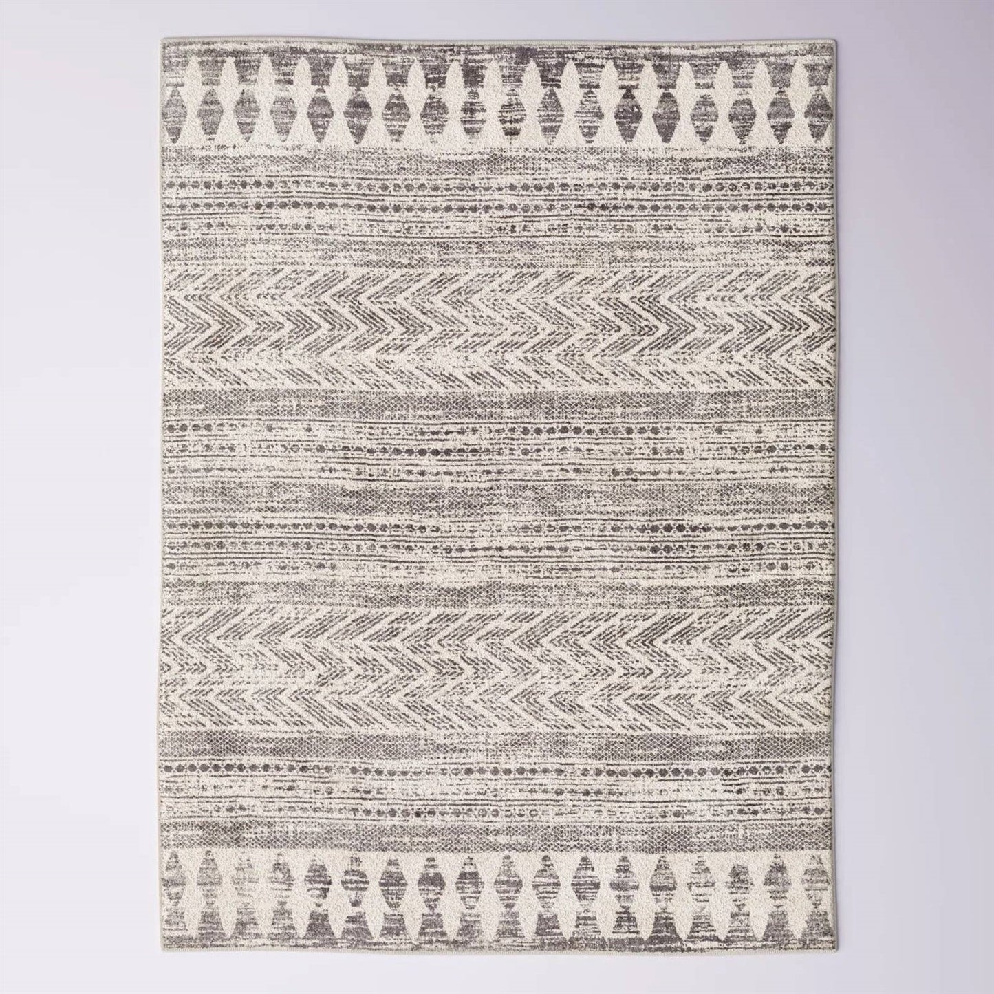 6.6-ft. x 9-ft. Grey Ivory Chevron Stripe Geometric Boho Style Area Rug with geometric patterns and distressed vintage look