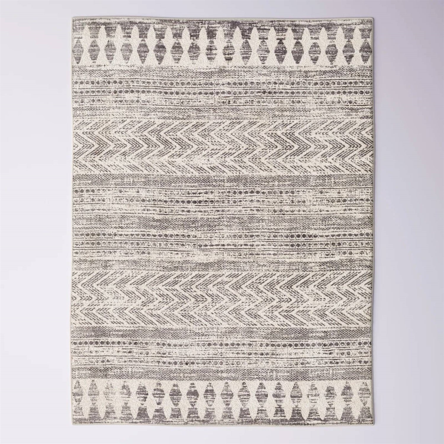 6.6-ft. x 9-ft. Grey Ivory Chevron Stripe Geometric Boho Style Area Rug with geometric patterns and distressed vintage look