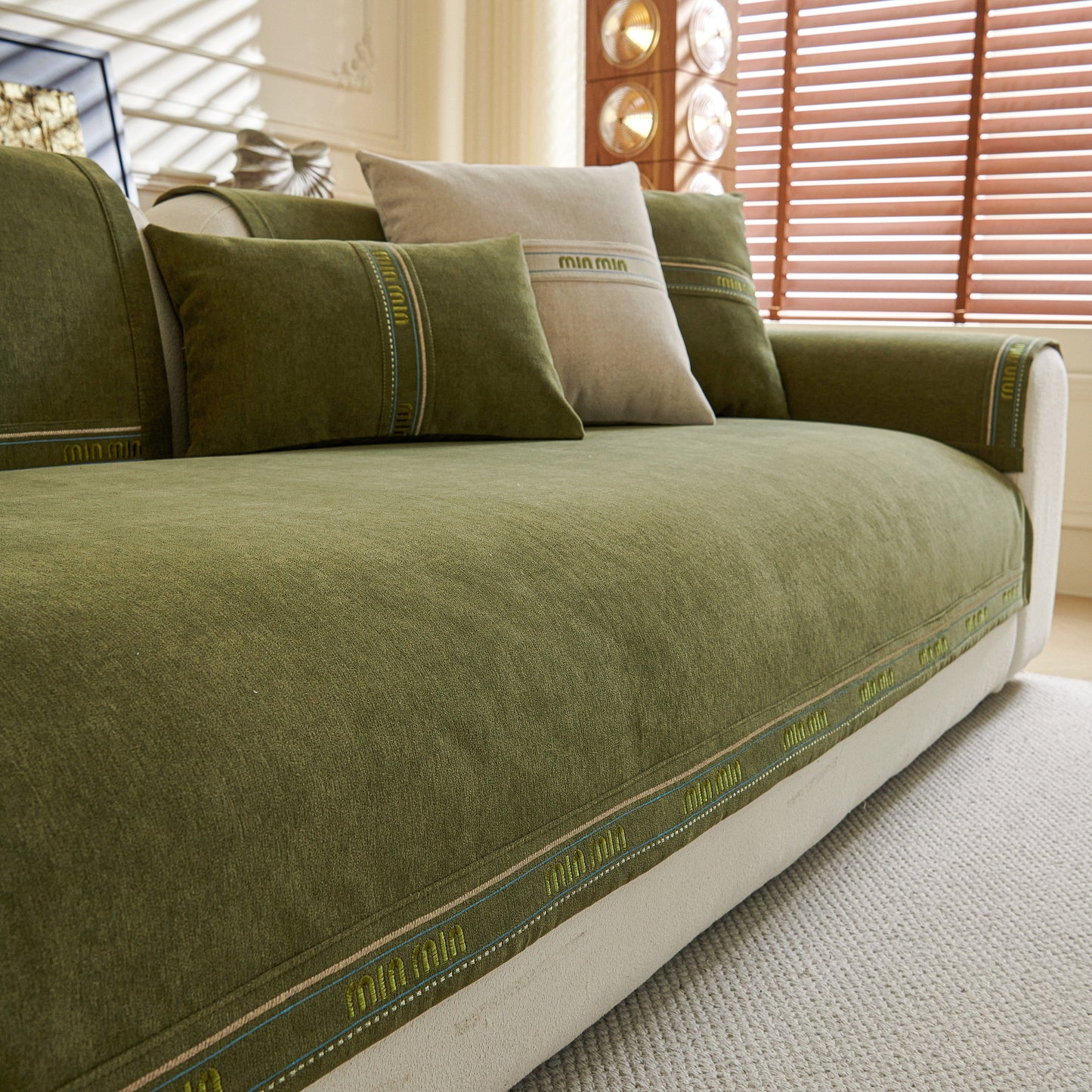 Chenille Sofa Cover Pet Mat, Non-Slip Couch Protector for Sectional & L-Shaped Sofas in neutral tone on green couch.