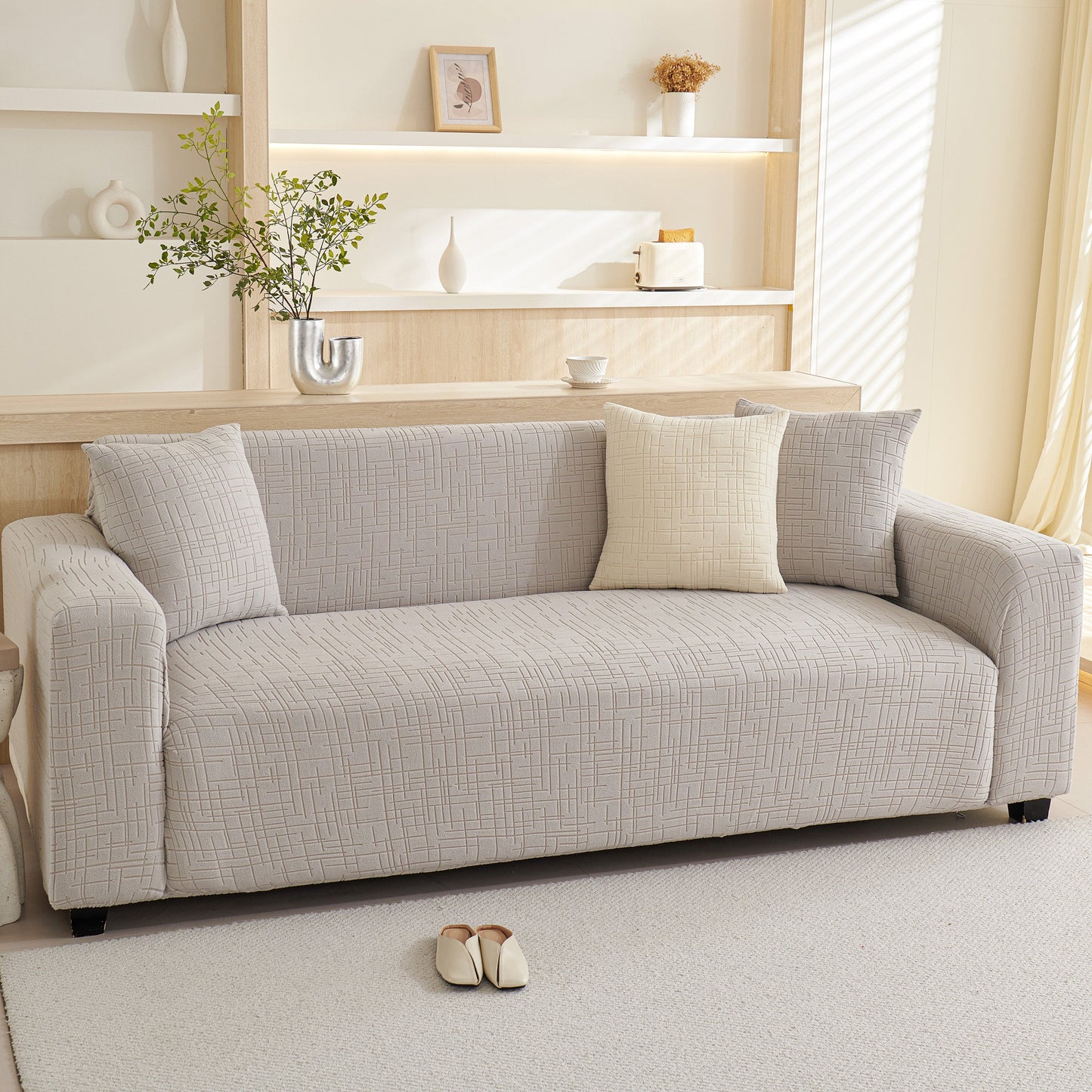Embossed Lines Couch Covers Stretchable Non-Slip & Washable Sofa Slipcovers on beige sofa in living room setting