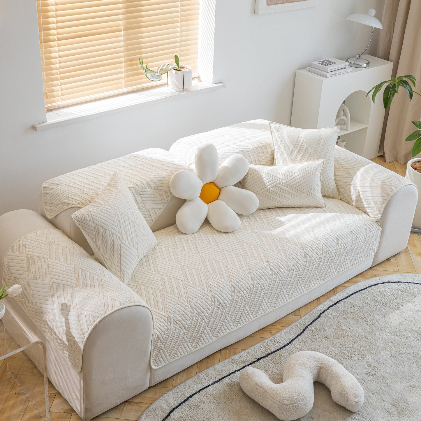Quilted Geometric Cotton Sofa Cover, Non-Slip & Thick Padded Furniture Covers on a living room sofa with decorative cushions.
