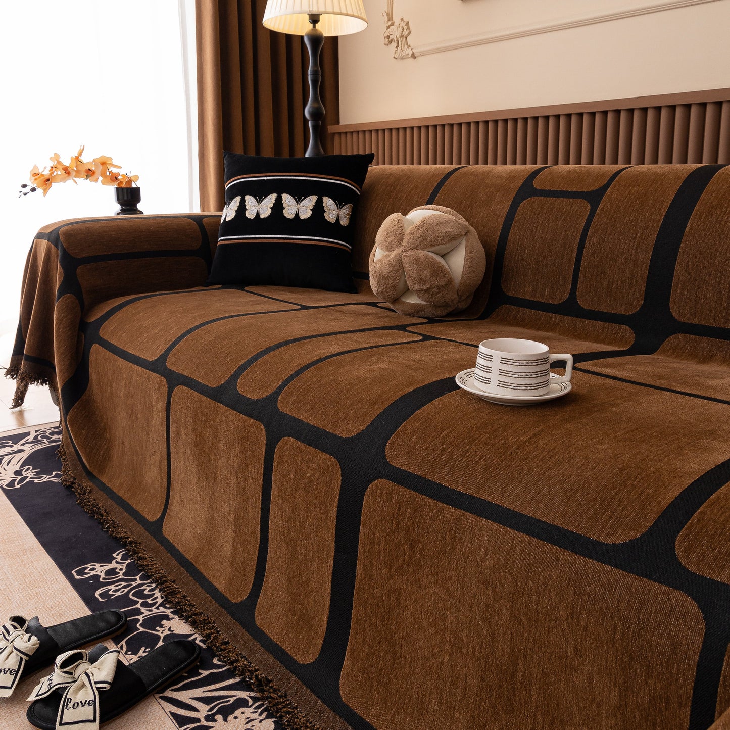 Modern Geometric Sofa Cover Decorative Couch Throw Blanket Furniture Protector in chenille fabric with geometric pattern and tassels.
