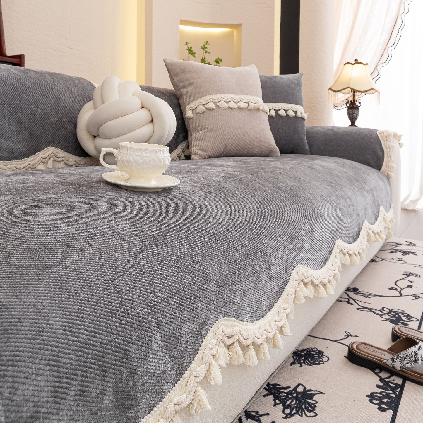 Chenille Sofa Cover Towel – Non-Slip, Washable Pets Couch Protector with Tassels in living room setting.