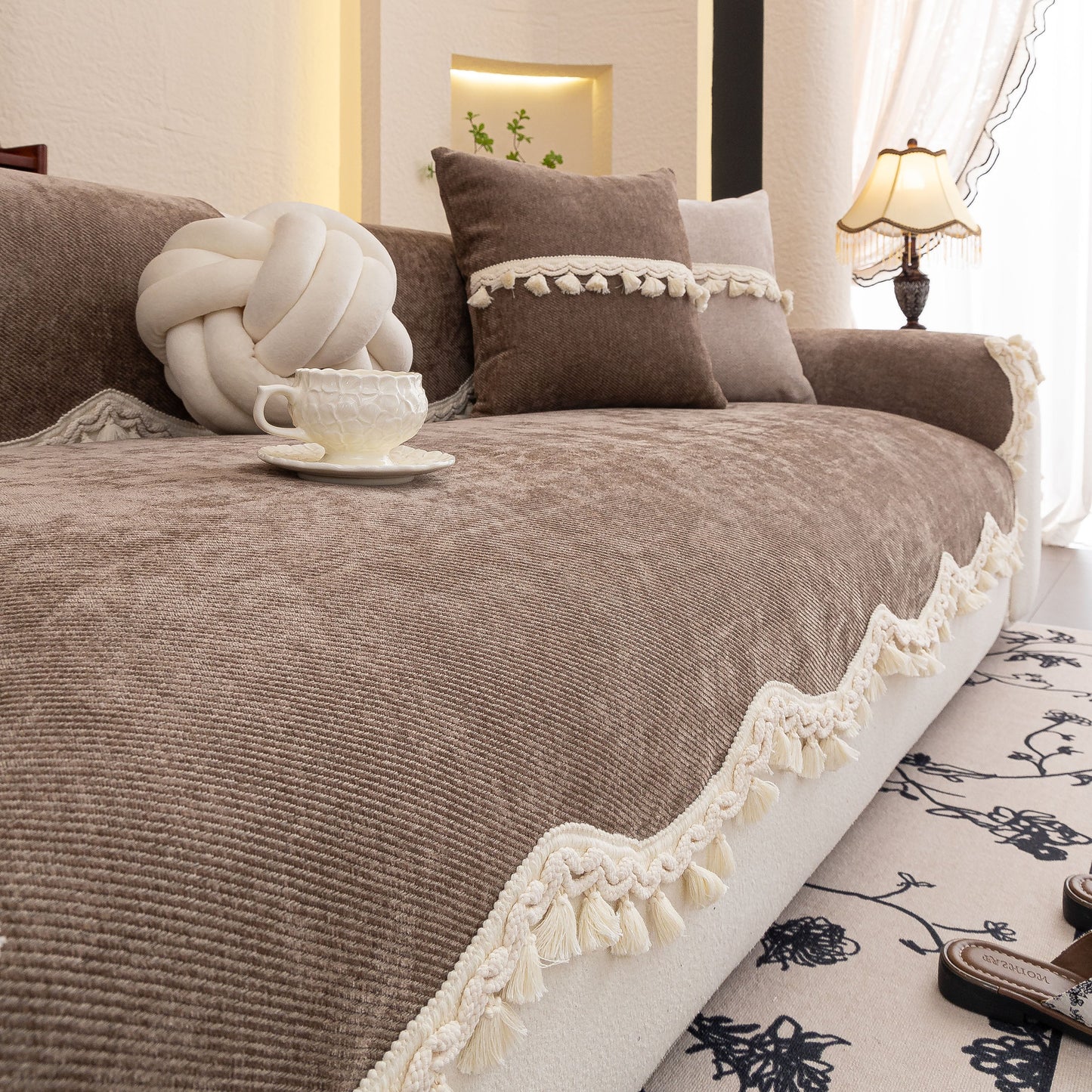 Chenille Sofa Cover Towel – Non-Slip, Washable Pets Couch Protector with Tassels on a cozy sofa setting
