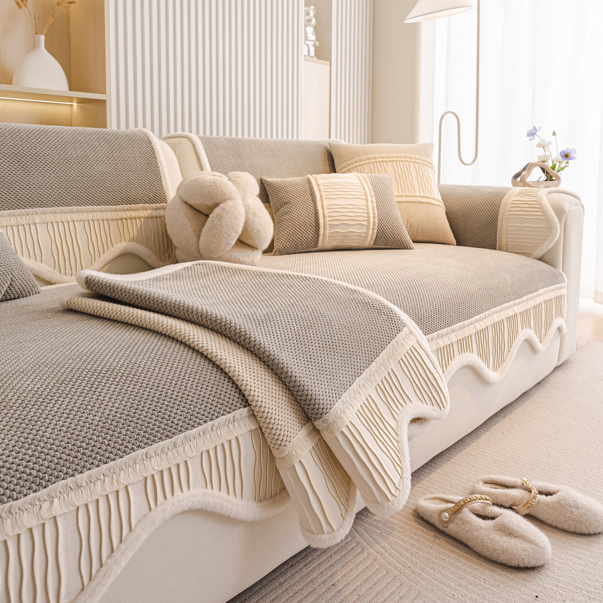 Luxurious beige and gray Dog Washable Sofa Protector Cover, Non-Slip Couch Slipcover with Soft Furry Trim in a cozy living room setting.