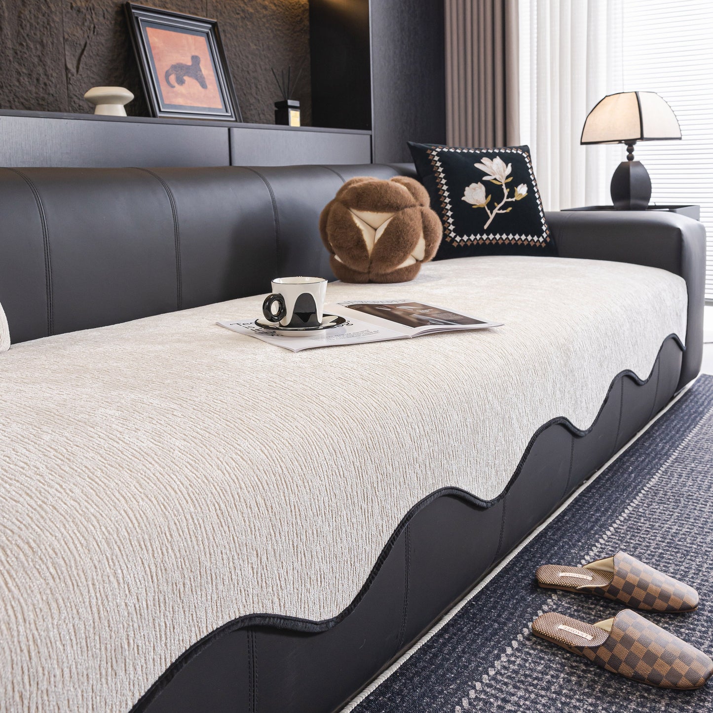 Chenille Couch Cover with Scalloped Edge, Non-Slip Modular Slipcover Sectional on leather sofa in modern living room.