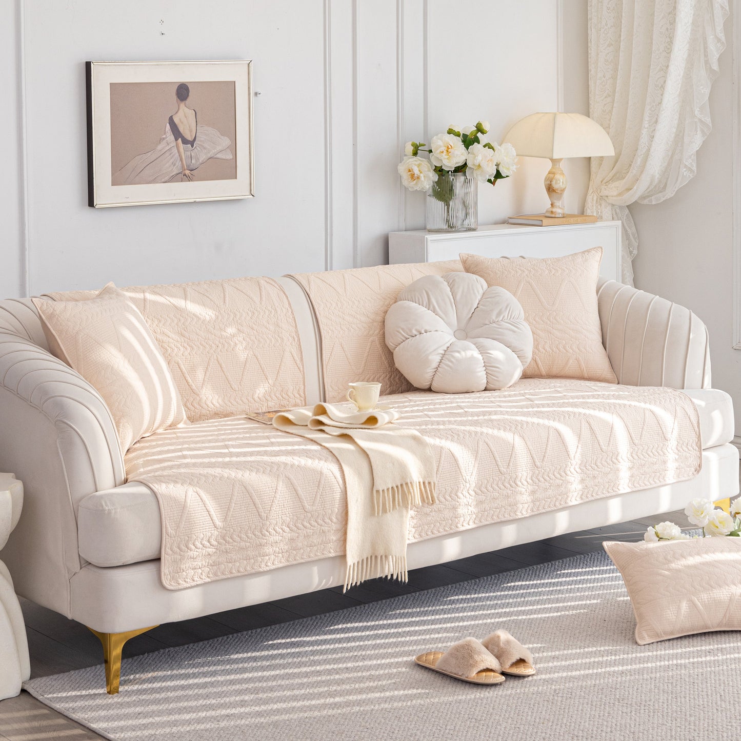 Geometric Textured Cotton Quilted Sofa Cover, Non-Slip Washable Couch Protector in an elegant living room setting with pillows.