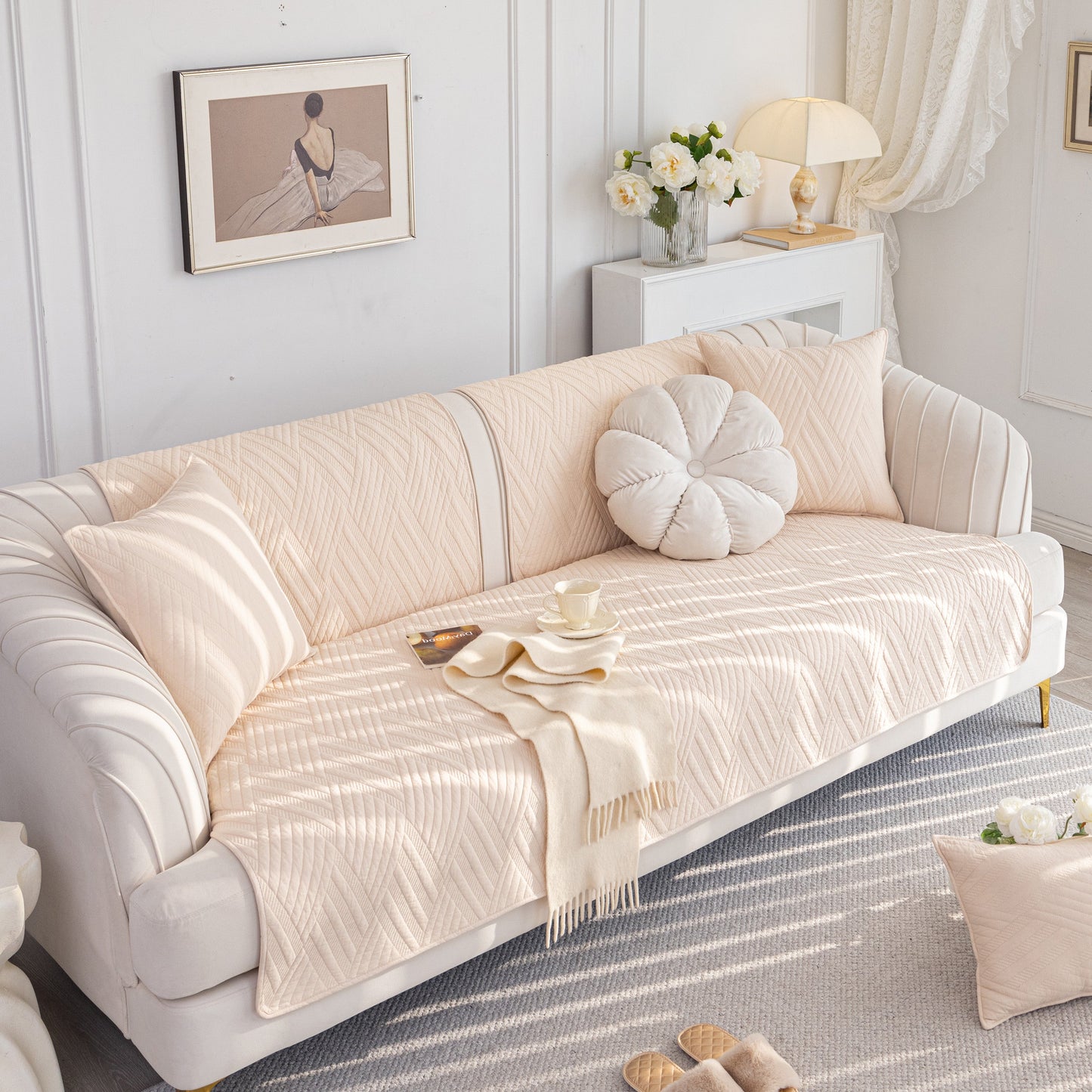 Quilted Geometric Cotton Sofa Cover, Non-Slip & Thick Padded Furniture Covers on a white sofa with pillows and a warm atmosphere.