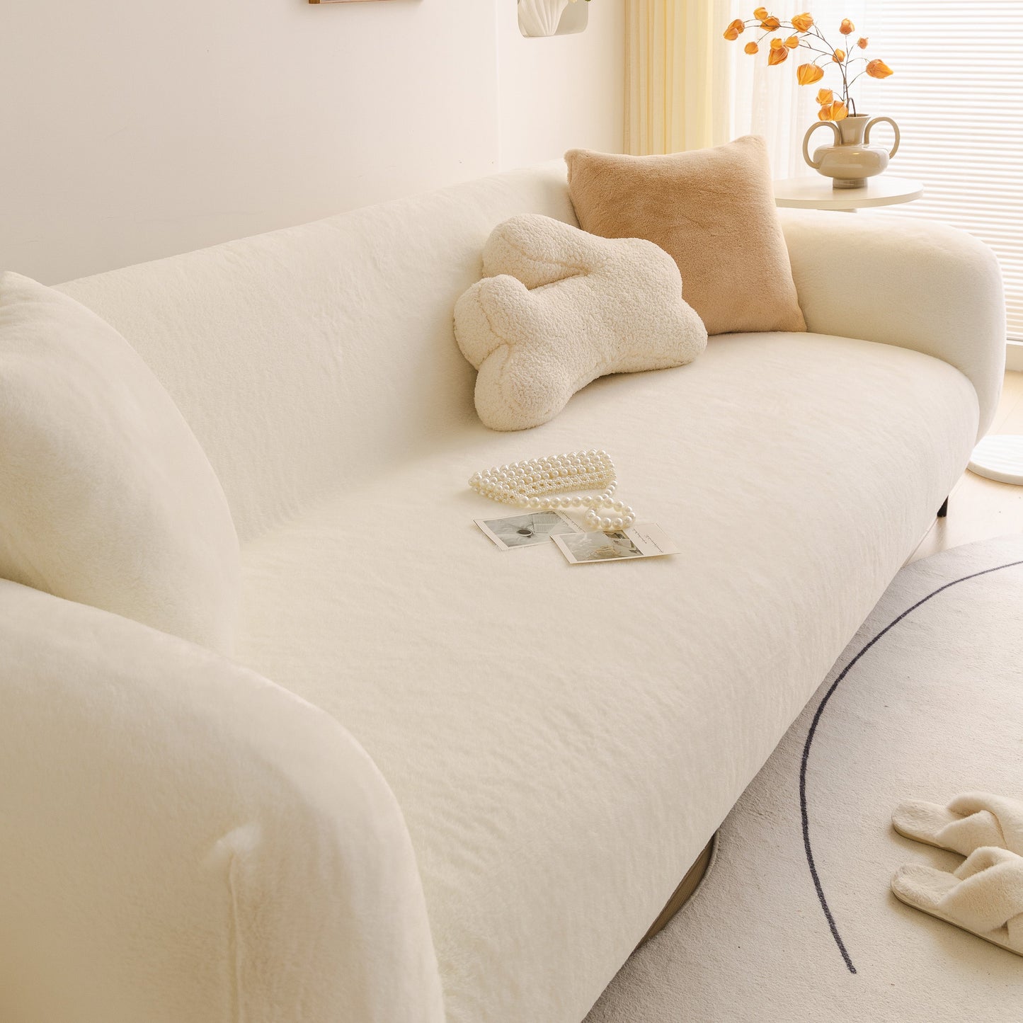 Soft Plush Warm Sofa Cover Stretchable Cozy Velvet Couch Protector for Fall & Winter on a beige couch in a cozy room setting.