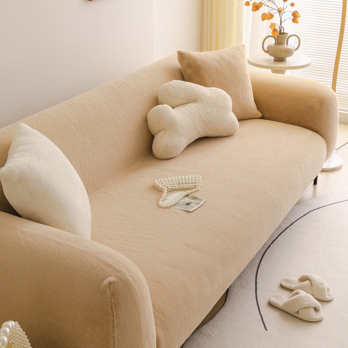 Soft Plush Warm Sofa Cover Stretchable Cozy Velvet Couch Protector for Fall & Winter in beige on a classic living room sofa.
