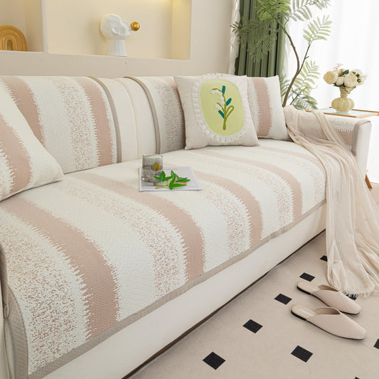 Striped Non-Slip Cooling Couch Cover, Summer Couch Pads for Seat Back Armrest on a beige sofa in a cozy living room setting.