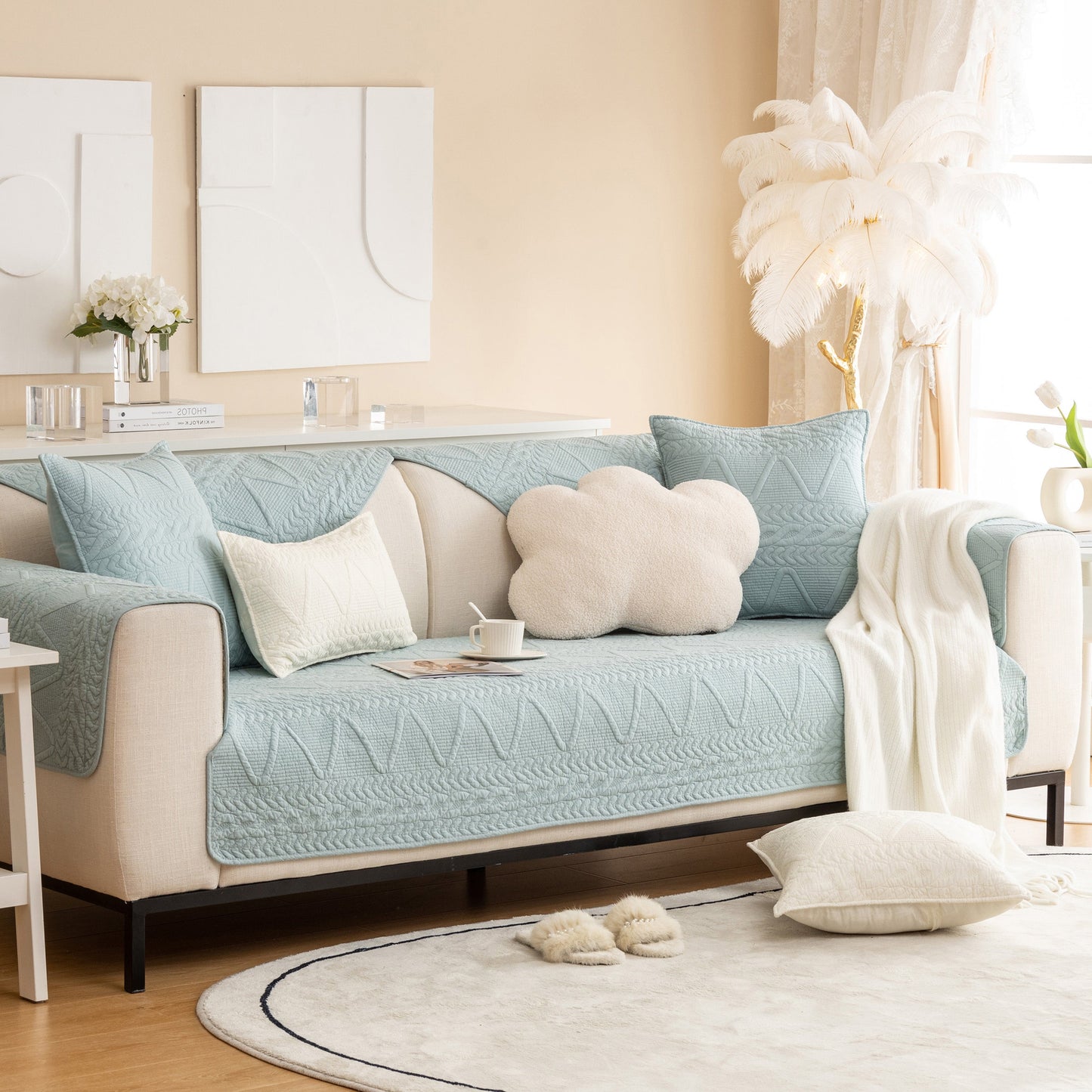 Geometric Textured Cotton Quilted Sofa Cover, Non-Slip Washable Couch Protector in modern living room with pillows and decor