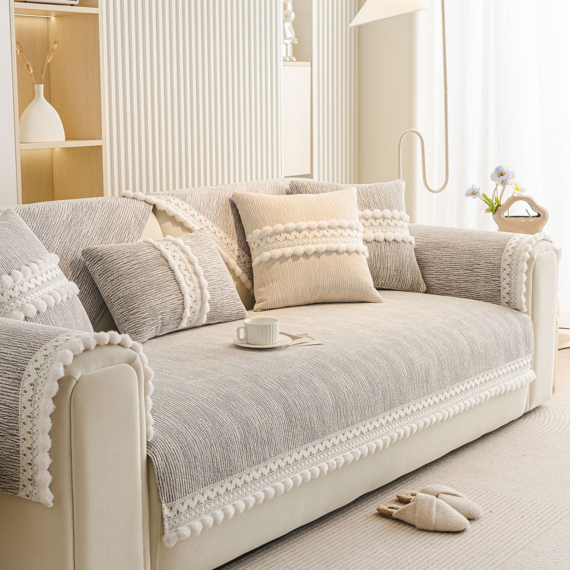 Soft Chenille Sectional Sofa Cover with Pom Pom Trim – Non-Slip Couch Protector in a modern living room setting.