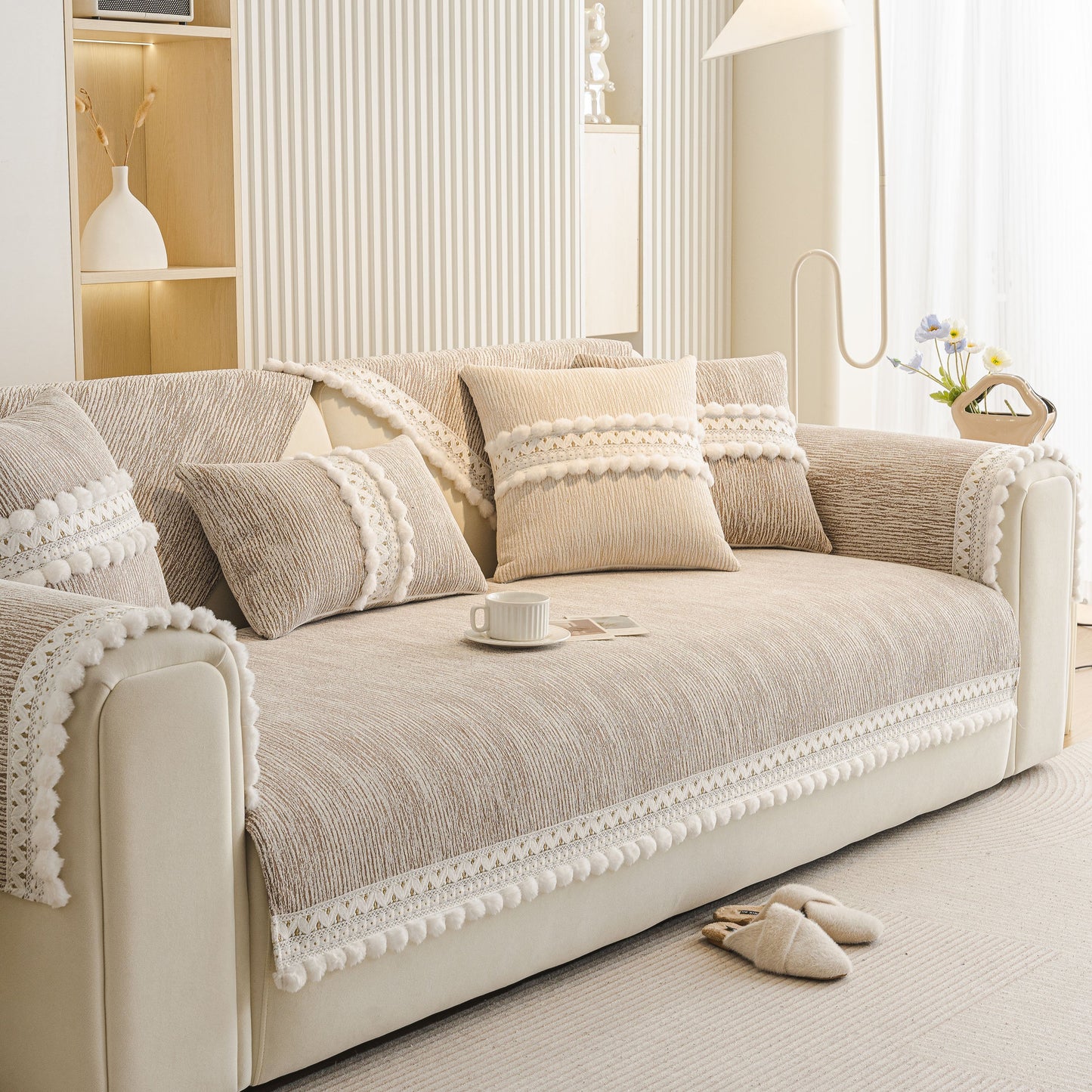 Soft Chenille Sectional Sofa Cover with Pom Pom Trim – Non-Slip Couch Protector displayed in a light modern interior setting