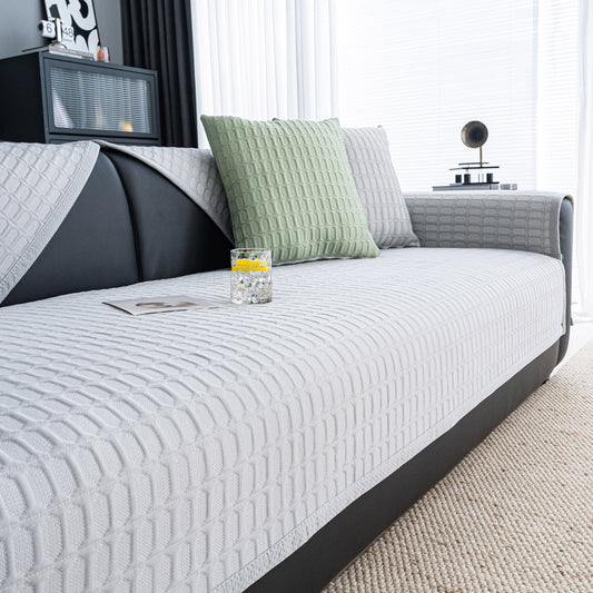 Geometric Textured Couch Slipcover Protector Non-Slip Ice Silk Sofa Cover for Couch in a modern living room setting.