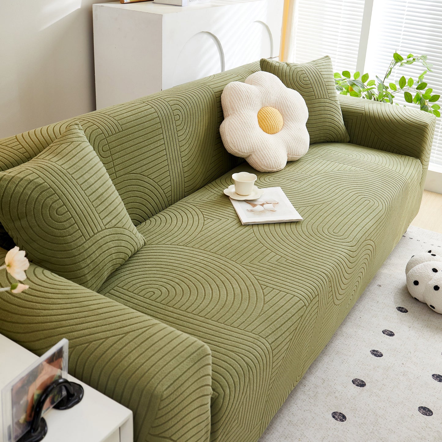 Fleece Stretch Sofa Slipcover Washable Soft Spandex Couch Cover Furniture Protector with geometric design on green sofa.