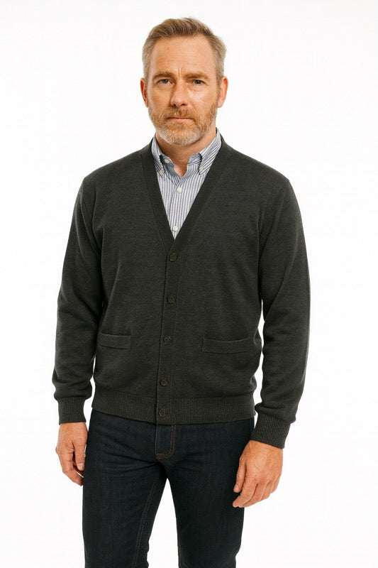 Man wearing Merino Wool Cardigan in Charcoal with button front and ribbed trim.