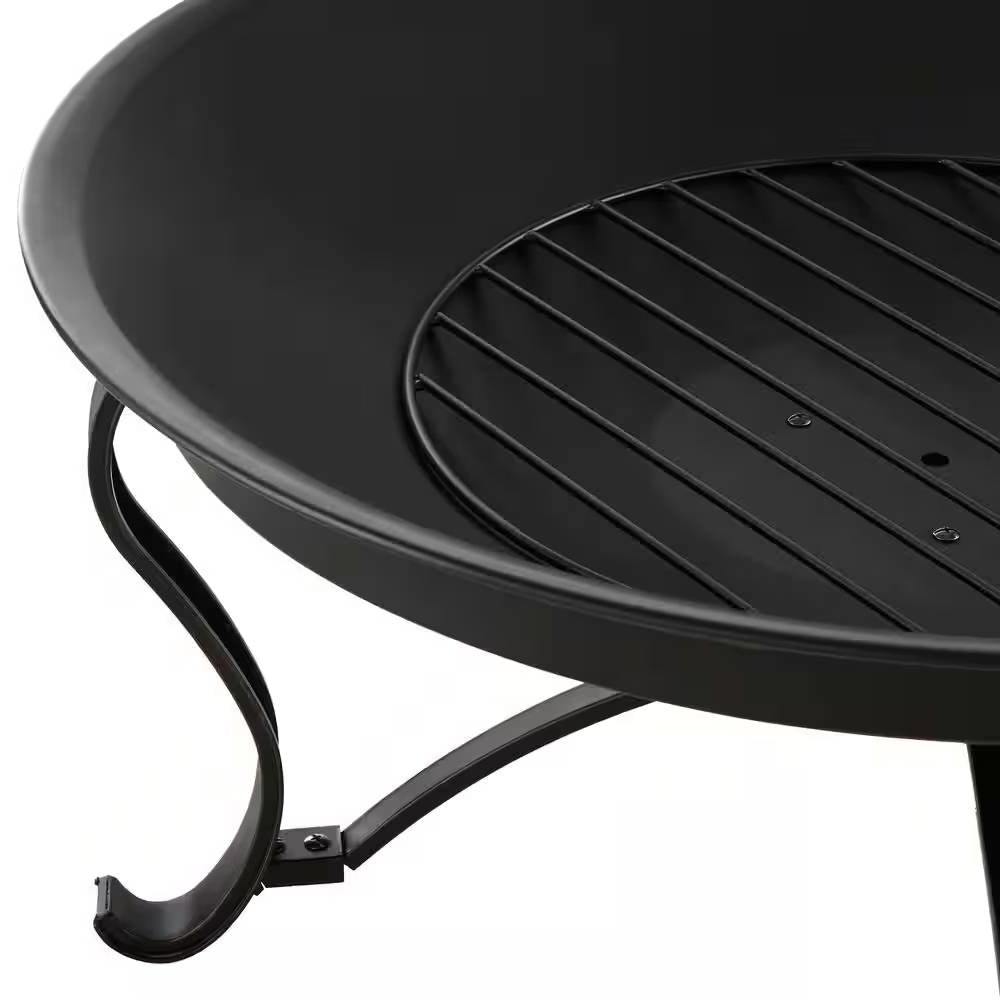 Close-up of the 30-inch Round Steel Outdoor Fire Pit with Mesh Cover and Poker in Bronze, showcasing decorative legs and fire bowl.