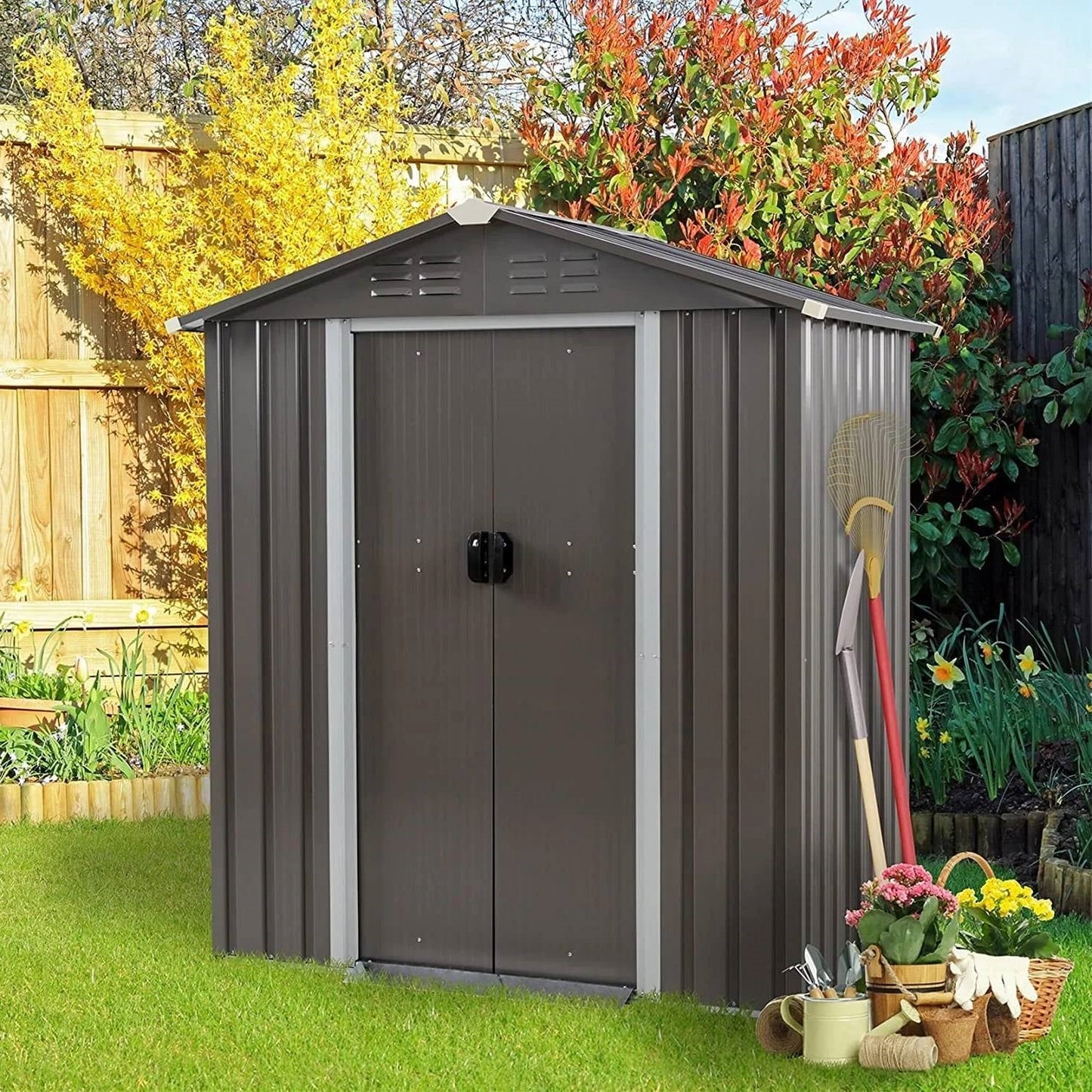 5 x 3 ft. Outdoor Grey Metal Garden Storage Shed in a backyard with gardening tools and vibrant plants around it.
