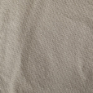 Close-up texture of 5 Pocket Jean Model fabric with a soft beige color.