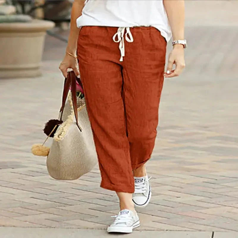 Person wearing Cotton Y2K Wide Leg Pants – High Waist Streetwear Baggy Trousers.