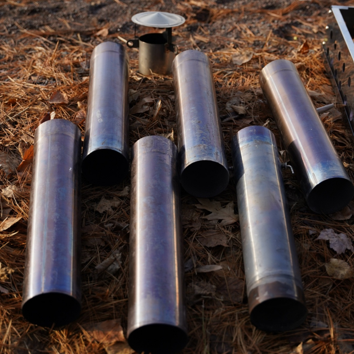 Sauna Stove Chimney Pipe | 3.5" extra chimney pipes displayed outdoors, ideal for replacement or extension of sauna chimney system for better draft.
